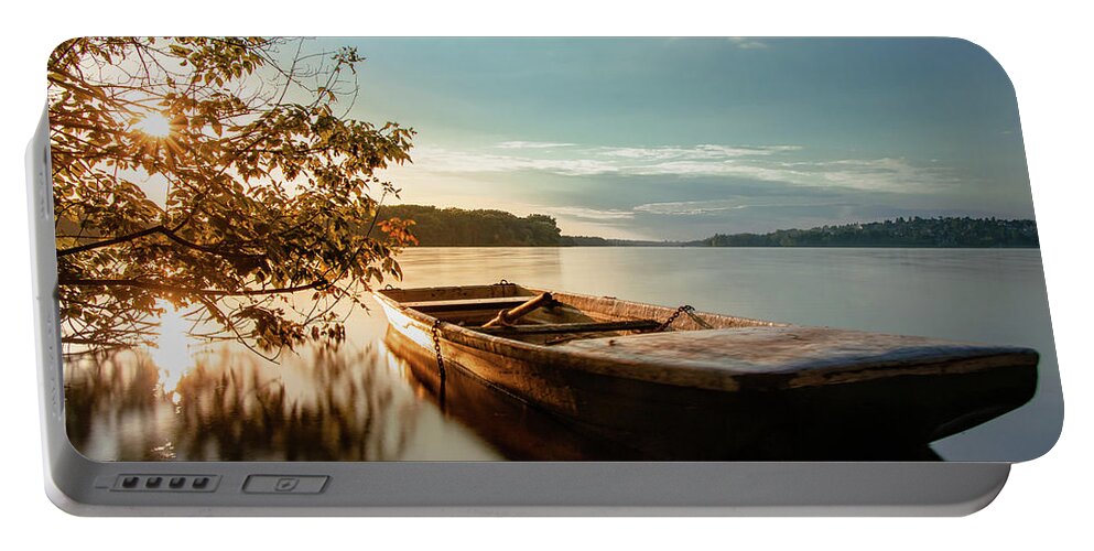 Rowboat Portable Battery Charger featuring the photograph Fairy-tale boat moored on the shore by Vaclav Sonnek