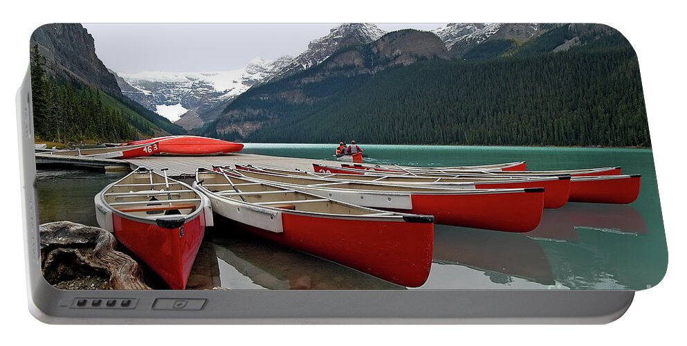 Alberta Portable Battery Charger featuring the photograph Fan Shaped Canoes - Lake Louise Banff - Banff National Park - Alberta - Canada by Paolo Signorini