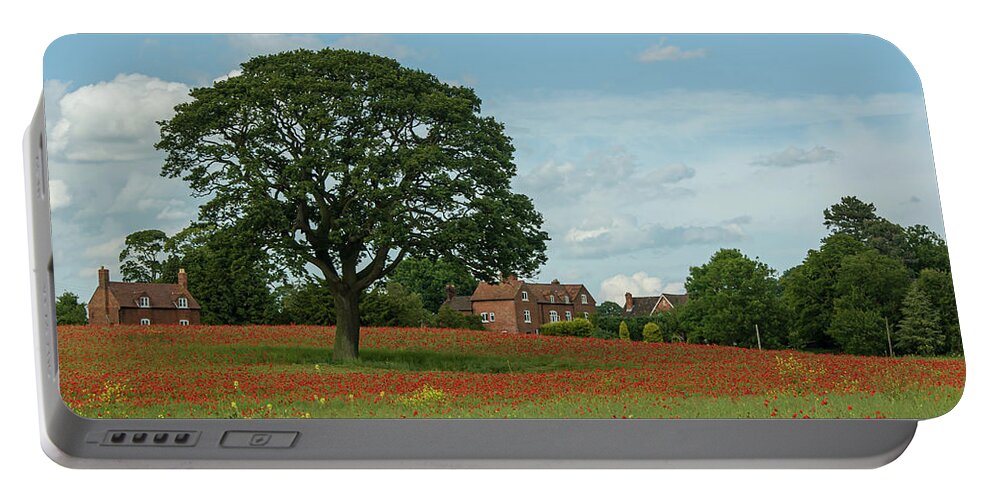 Circle Portable Battery Charger featuring the photograph Field of poppies by Average Images