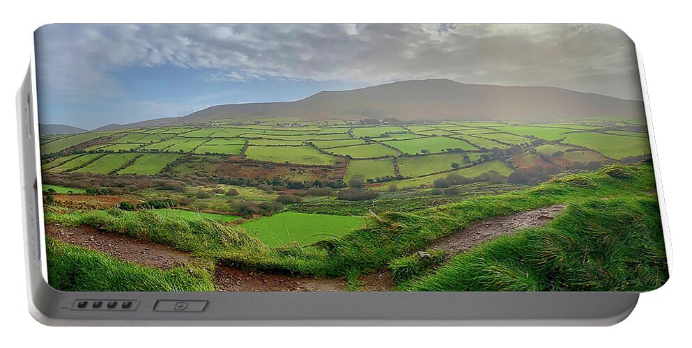 Green Fields Portable Battery Charger featuring the photograph Fields of Green in Ireland by Peggy Dietz
