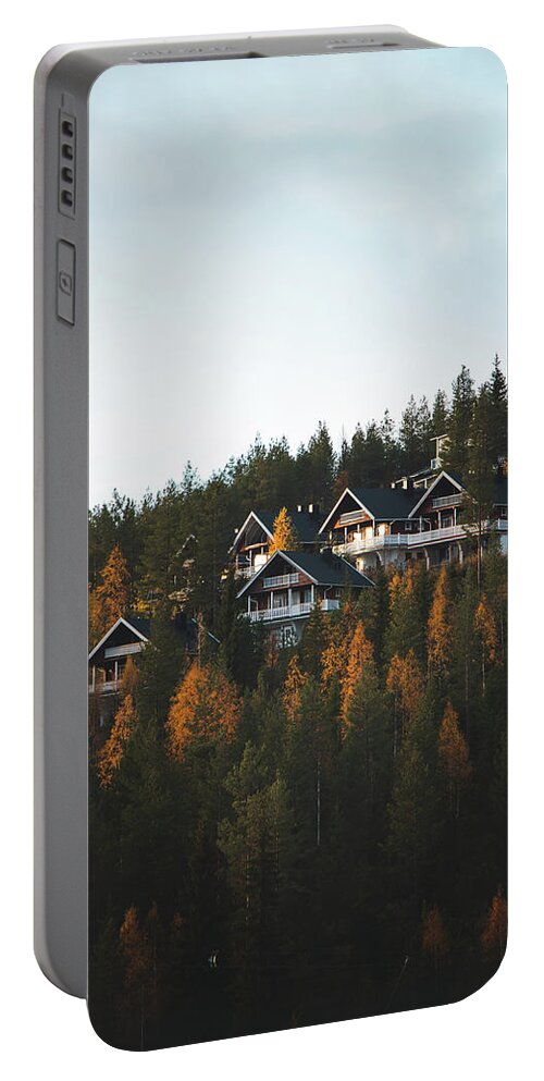 Cottage Portable Battery Charger featuring the photograph Finnish cabins in the polar sunset by Vaclav Sonnek