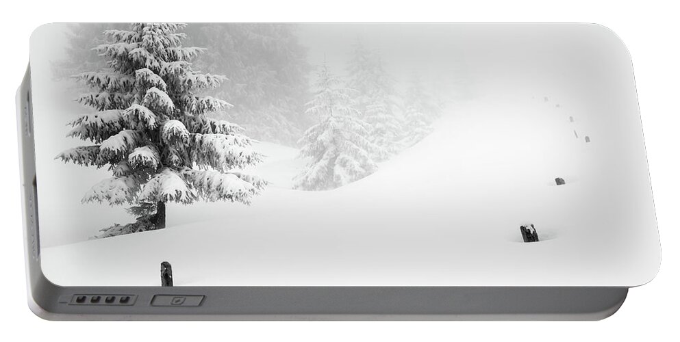 Black And White Portable Battery Charger featuring the photograph Fir Trees in Snowfall by Stan Weyler