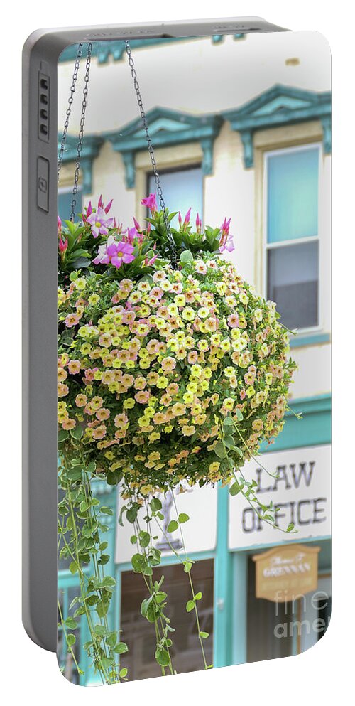 Flowers Portable Battery Charger featuring the photograph Flowers before the law by Bentley Davis