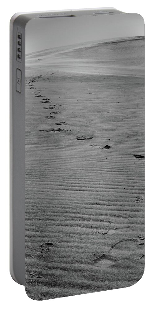 Black And White Portable Battery Charger featuring the photograph Footprints in the Sand by Melissa Southern