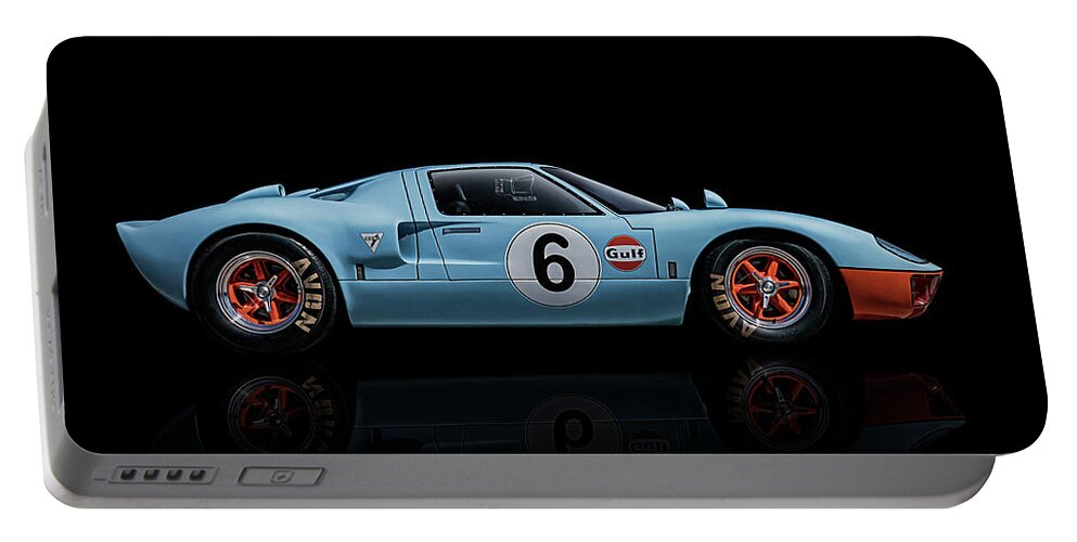 Racing Portable Battery Charger featuring the digital art Ford GT 40 by Douglas Pittman