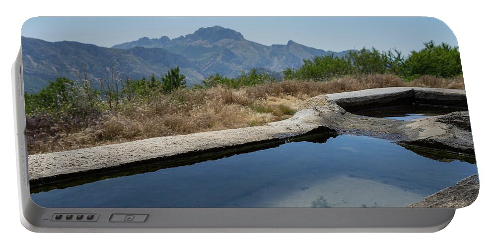 Fountain Portable Battery Charger featuring the photograph Fountain of youth in the mountains by Adriana Mueller