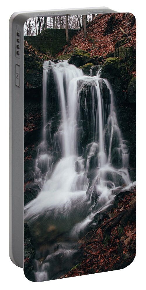 Splash Portable Battery Charger featuring the photograph Frosty waterfall Tosanovsky in Czech republic by Vaclav Sonnek