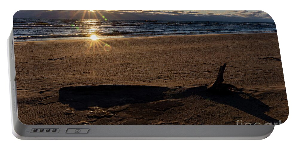 Sunrise Portable Battery Charger featuring the photograph Frozen sand sunrise 2 by Eric Curtin