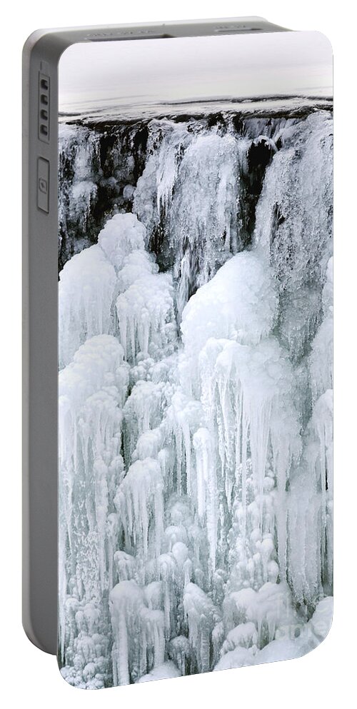 Ice Portable Battery Charger featuring the photograph Frozen Water Fall by Olivier Le Queinec
