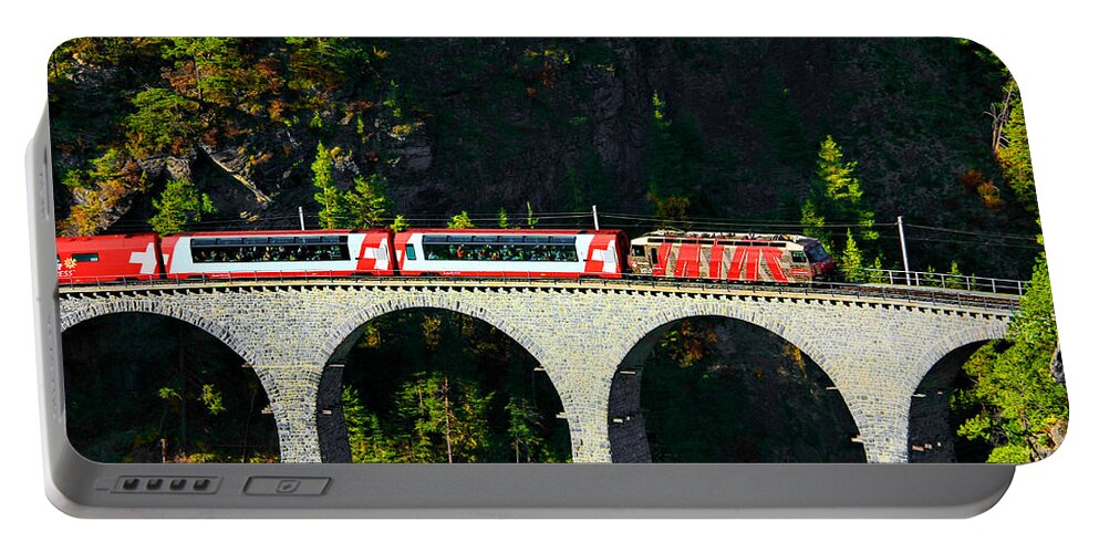 Glacier Express Portable Battery Charger featuring the photograph Glacier Express on the Landwasser Viadukt by Steve Ember