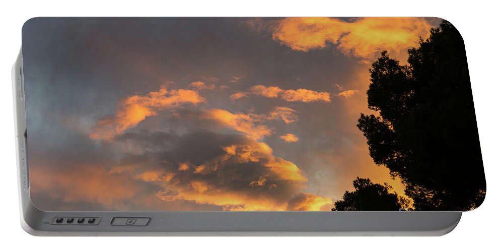 Clouds Portable Battery Charger featuring the photograph Glowing sky by Adriana Mueller