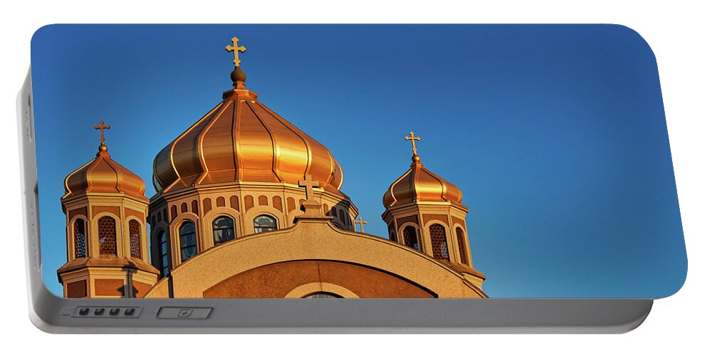 Church Portable Battery Charger featuring the photograph Golden cupolas by Tatiana Travelways