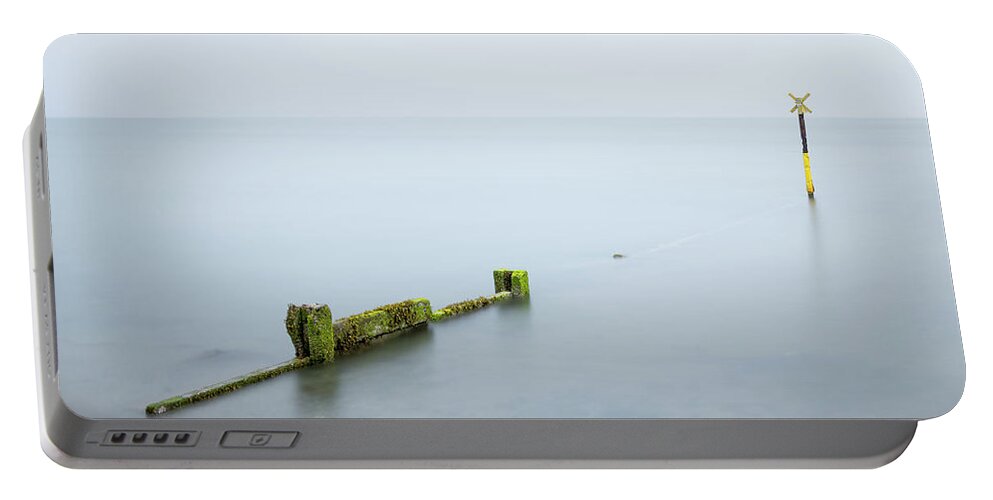 Carrickfergus Portable Battery Charger featuring the photograph Groyne Injury by Nigel R Bell