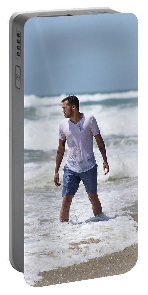 Man Portable Battery Charger featuring the photograph Handsome young man in the ocean by Mark Stout