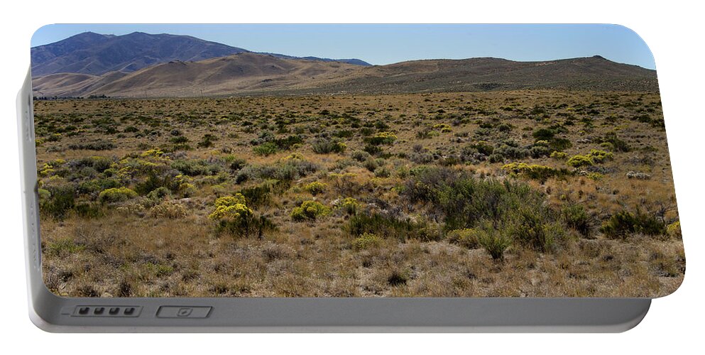 Sky-blue Portable Battery Charger featuring the photograph High Desert by Ron Roberts