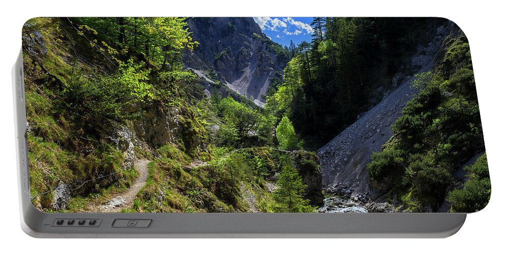 Alpine Portable Battery Charger featuring the photograph Hiking Trail Beneath Wild Mountain River In Oetschergraeben in Austria by Andreas Berthold