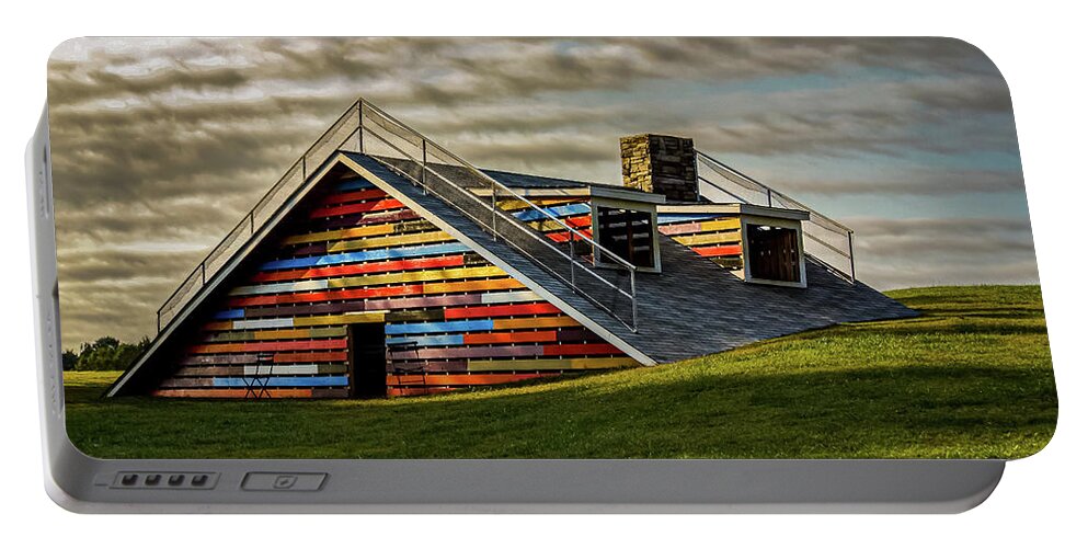 Roof Portable Battery Charger featuring the photograph House In The Ground by Rick Nelson