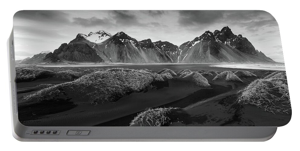 Iceland Portable Battery Charger featuring the photograph Black and White Icelandic mountain landscape, Vestrahorn black mountains Iceland by Michalakis Ppalis