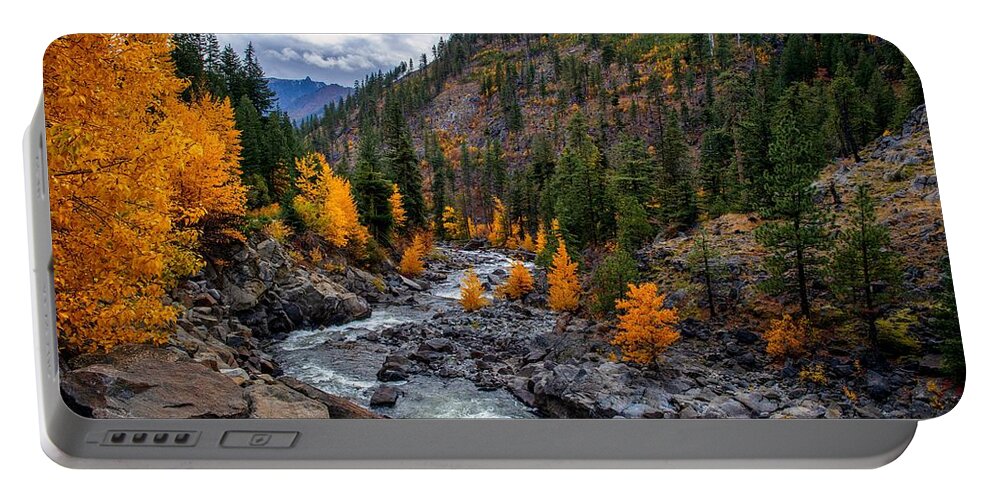 Icicle River Fall Colors Portable Battery Charger featuring the photograph Icicle River Fall Colors by Lynn Hopwood