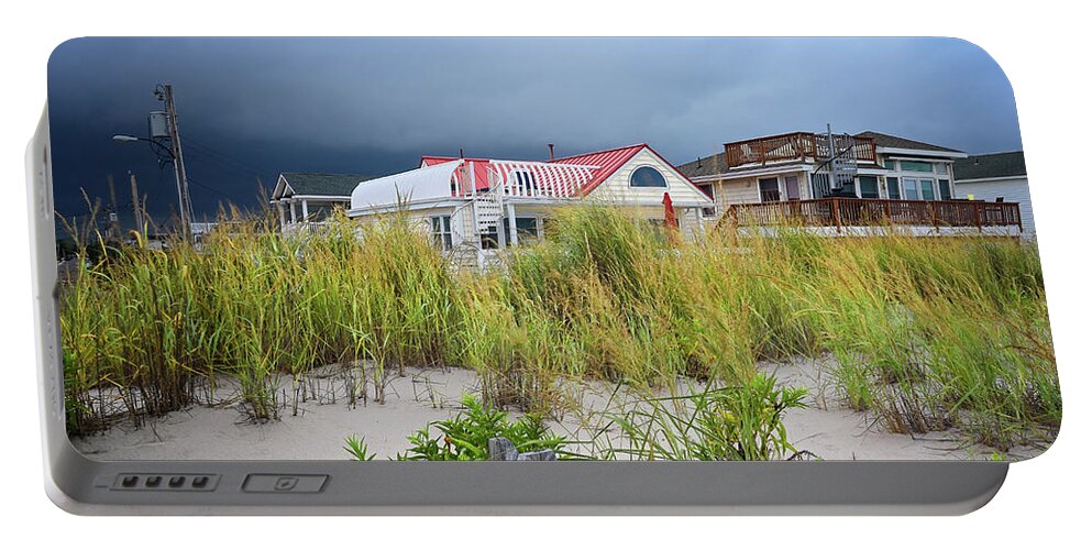 Beach Portable Battery Charger featuring the photograph Ida Approaching by Steven Nelson
