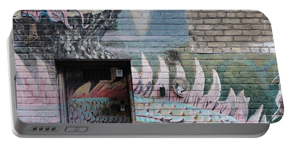 Urban Portable Battery Charger featuring the photograph Iguana Wall by Kreddible Trout