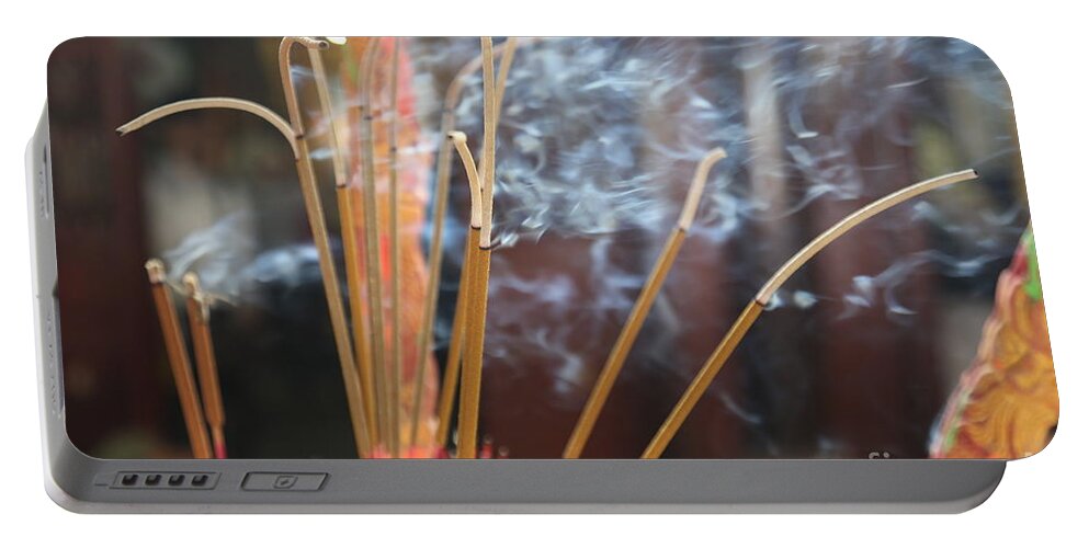 Incense Portable Battery Charger featuring the photograph Incense Burning Asia by Chuck Kuhn