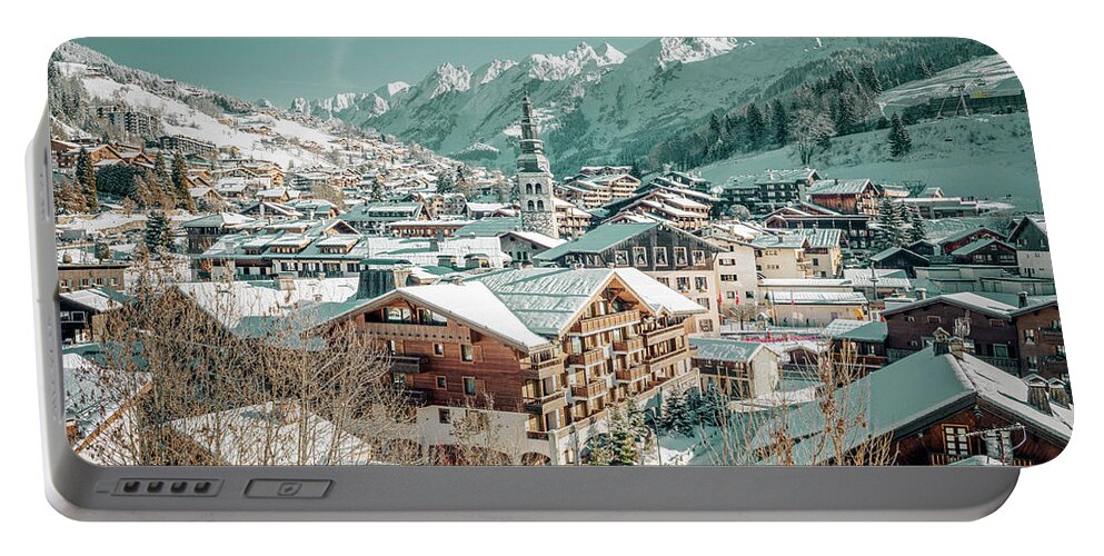 Beauty In Nature Portable Battery Charger featuring the photograph La Clusaz winter sports resort in the French Alps by Benoit Bruchez