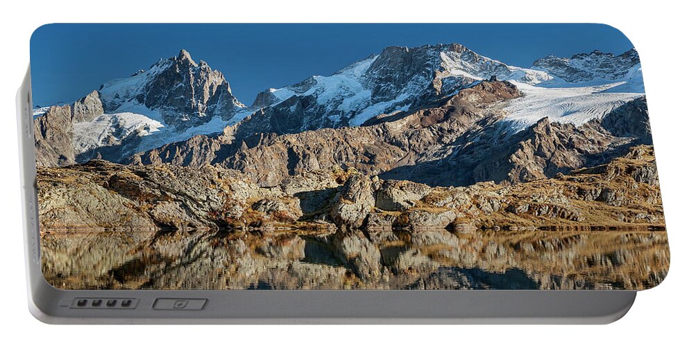 Lake Portable Battery Charger featuring the photograph La Meije peak mirrored in Lake Lerie by Olivier Parent