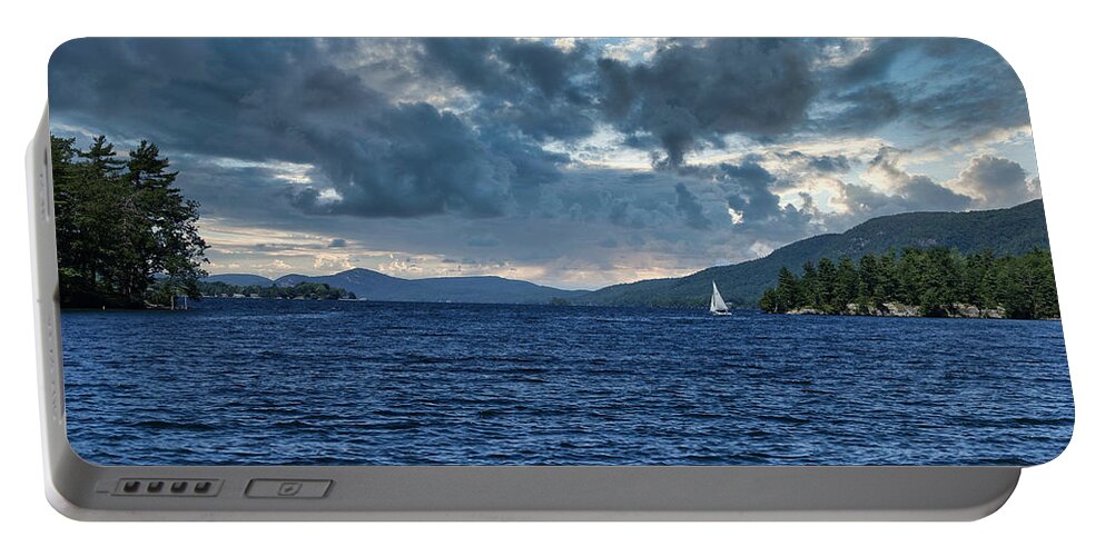Boat Portable Battery Charger featuring the photograph Lake George Sailboat and Storm Clouds by Russel Considine