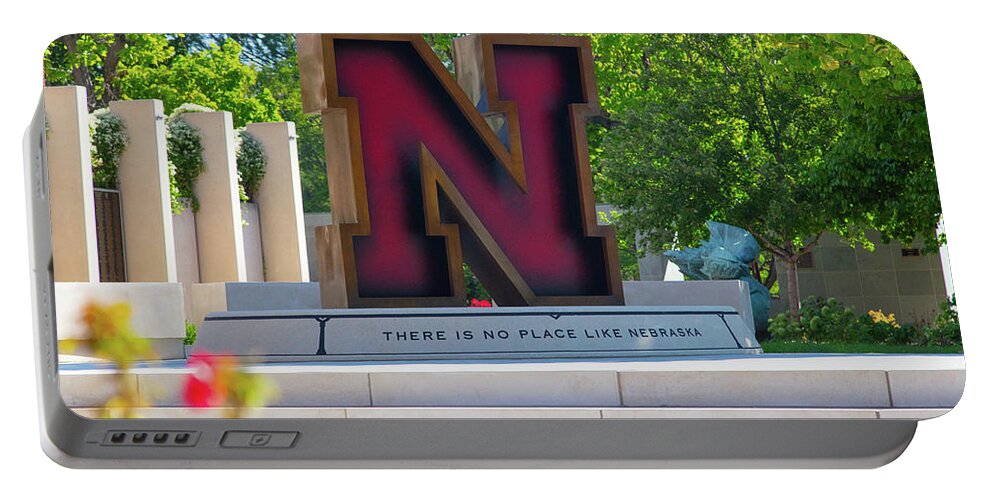 College Campus Tour Portable Battery Charger featuring the photograph Large Red N statue at the University of Nebraska by Eldon McGraw