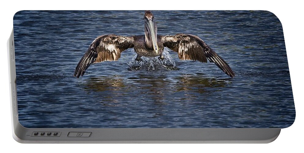 Brown Pelican Portable Battery Charger featuring the photograph Liftoff by Ronald Lutz