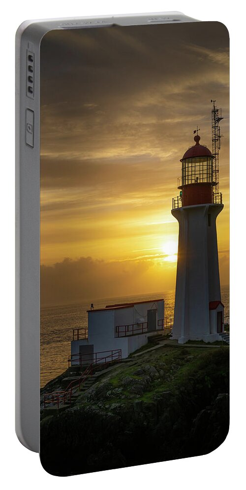 Sunset Portable Battery Charger featuring the photograph Lighthouse at Sunset by Bill Cubitt