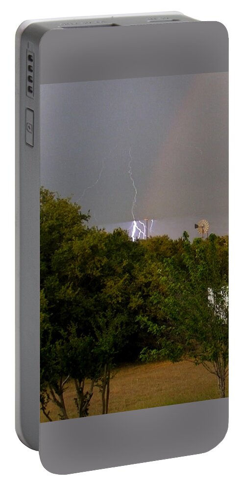  Portable Battery Charger featuring the photograph Lightning Hitting Power Line by Ivars Vilums