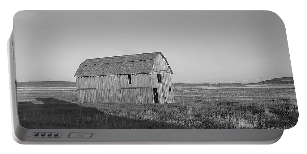 Barn Portable Battery Charger featuring the photograph Little Barn on the Wyoming Plains by Cathy Anderson