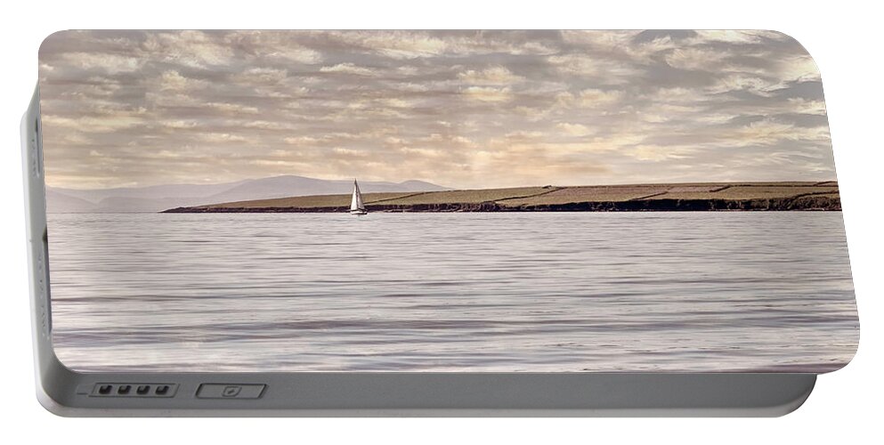 Boats Portable Battery Charger featuring the photograph Lone White Sailboat in Ireland in Neutral Vintage Tones by Debra and Dave Vanderlaan