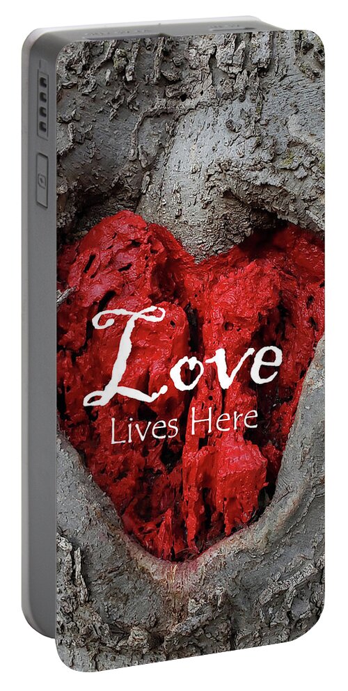 Love Portable Battery Charger featuring the photograph LOVE LIVES HERE Red Heart In a Tree by Lynnie Lang