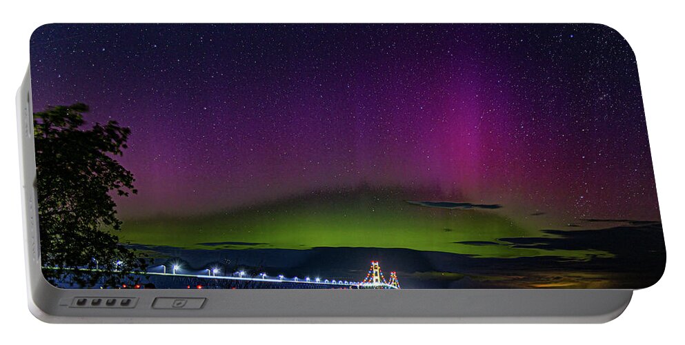 Aurora Portable Battery Charger featuring the photograph Mackinaw Bridge with Lady Aruora by Joe Holley