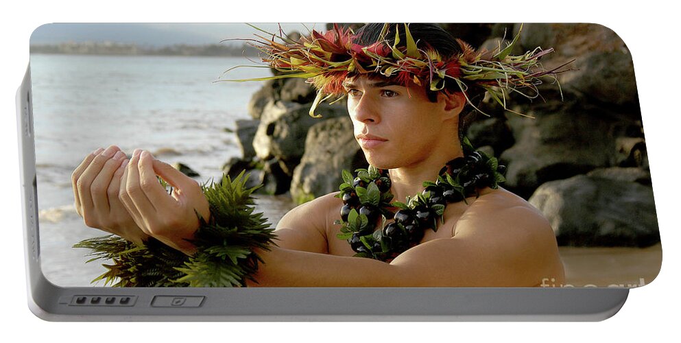 Male Hula Dancer Portable Battery Charger featuring the photograph Male Hula Dancer poses with hands reaching out by Gunther Allen