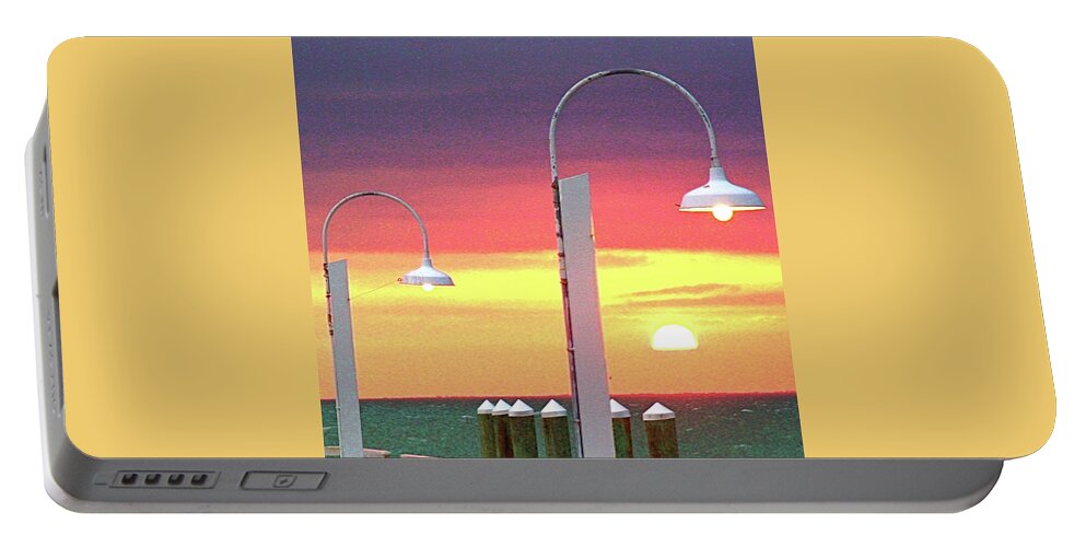 Sunset Portable Battery Charger featuring the photograph Manmade and Heavenly Light by Dorsey Northrup