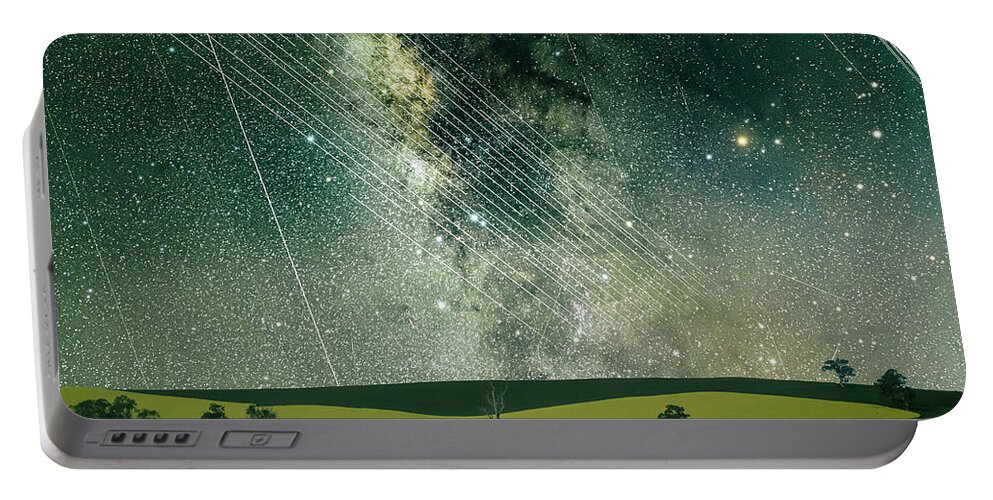 Astrophotography Portable Battery Charger featuring the photograph Manmade by Ari Rex