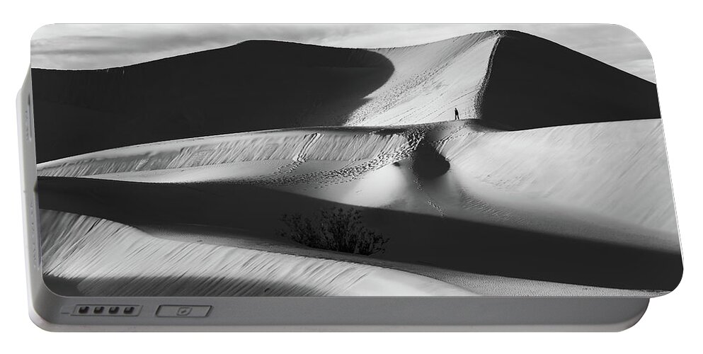 American Landscape Portable Battery Charger featuring the photograph Lone Hiker on Dunes bw by Jonathan Nguyen