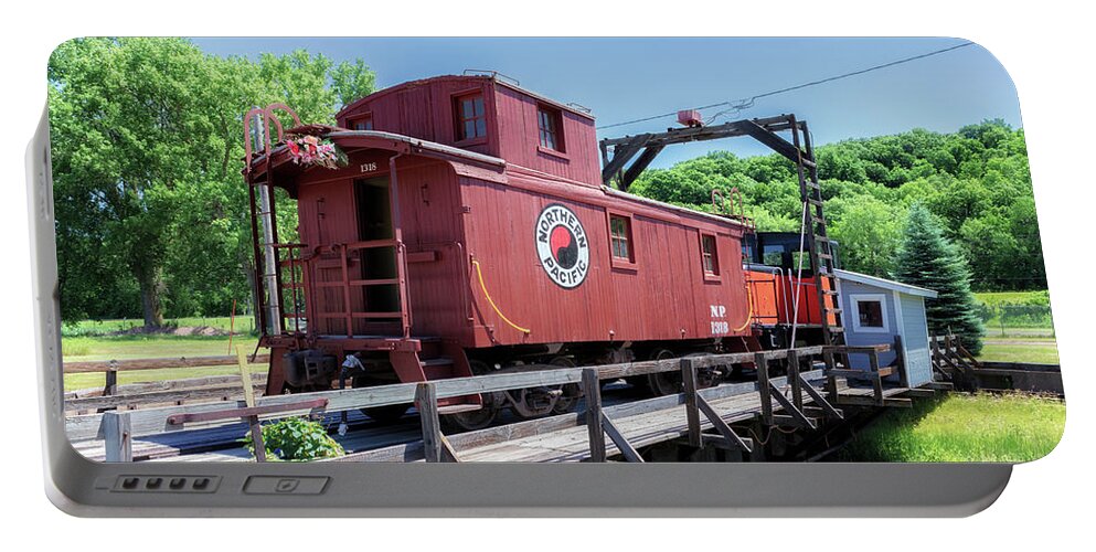 Railroad Portable Battery Charger featuring the photograph Milwaukee Railroad Shops Historic District Turntable by Susan Rissi Tregoning