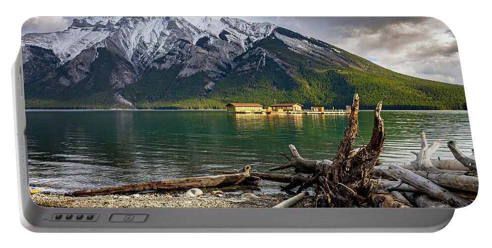 Lake Portable Battery Charger featuring the photograph Minnewanka Boat House by Thomas Nay