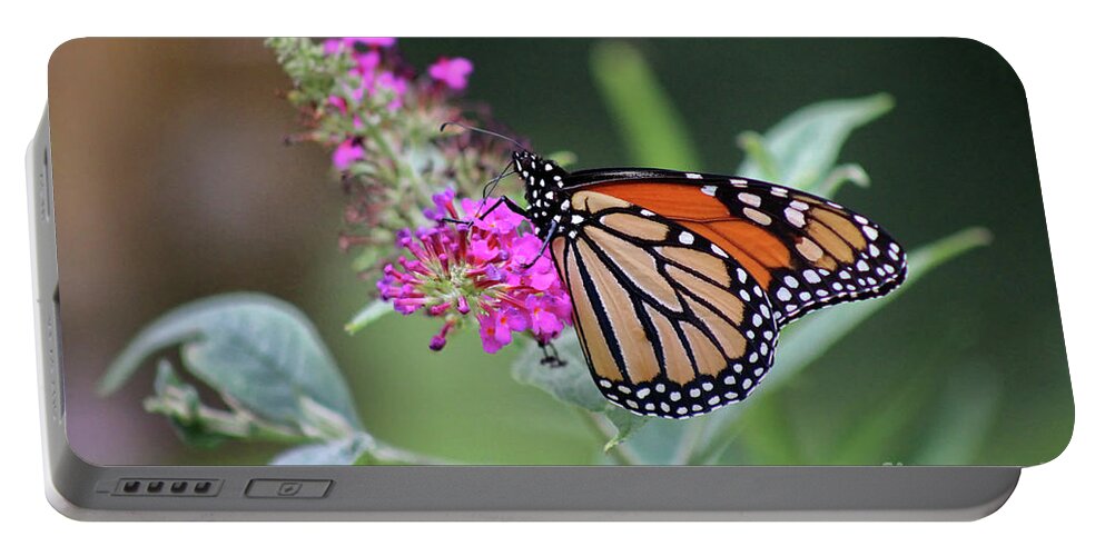 Monarch Portable Battery Charger featuring the photograph Monarch on Magenta Butterfly Bush by Karen Adams