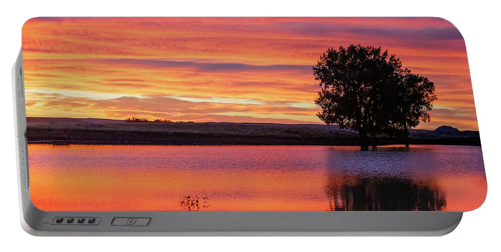 Colorful Portable Battery Charger featuring the photograph Montana Sunset by Todd Klassy