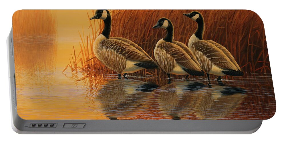 Canada Geese Portable Battery Charger featuring the painting Morning Gold by Guy Crittenden