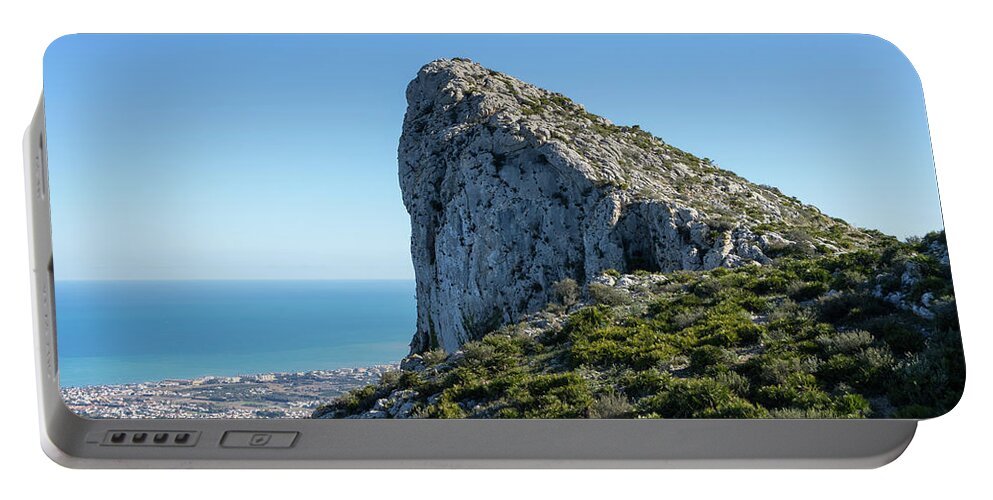 Mountain Portable Battery Charger featuring the photograph Morro de Segaria and the Mediterranean sea by Adriana Mueller