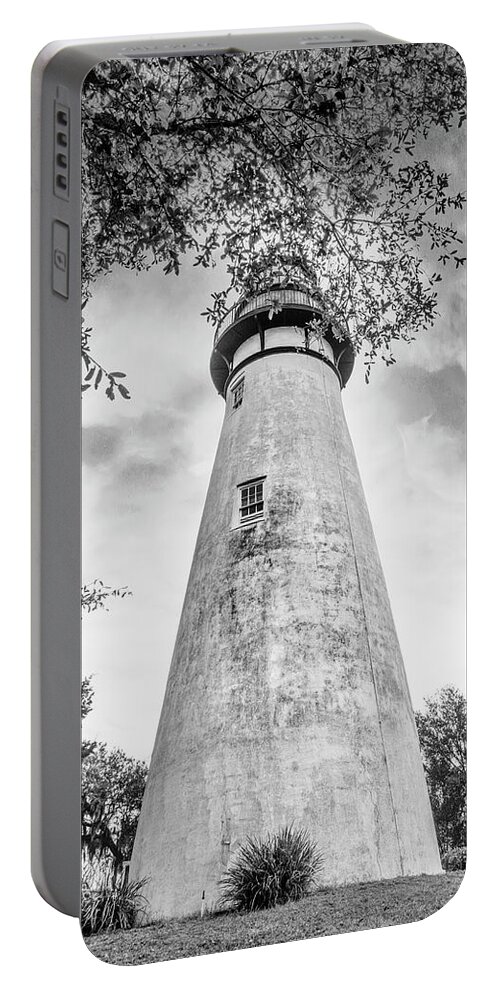 Black Portable Battery Charger featuring the photograph Mossy Trees around the Amelia Island Lighthouse Black and White by Debra and Dave Vanderlaan
