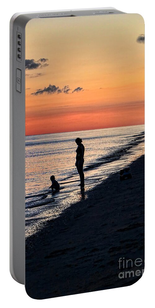 Sunset Portable Battery Charger featuring the photograph Mother and Child Sanibel Sunset by Jeff Breiman