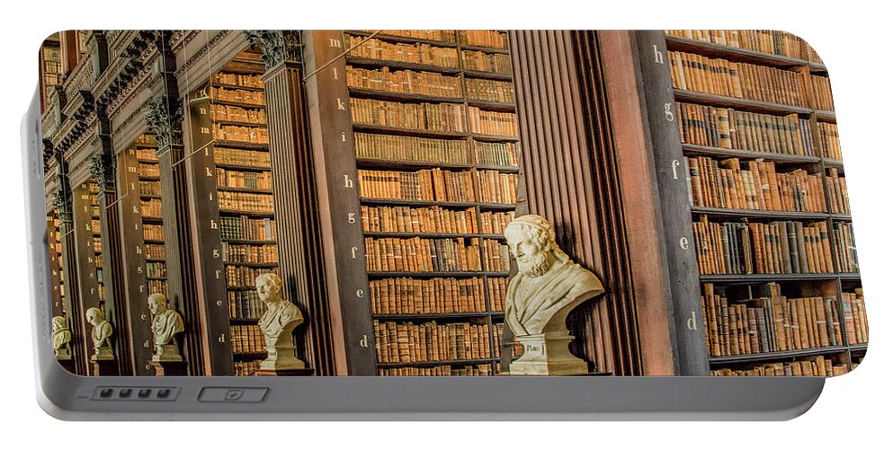 Trinity College Library Portable Battery Charger featuring the photograph Much More Than A Library by Marcy Wielfaert